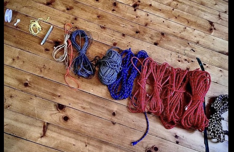 Various ropes, cords and strings. Wound up and lying on floor before rehearsal of Threads of Connection.